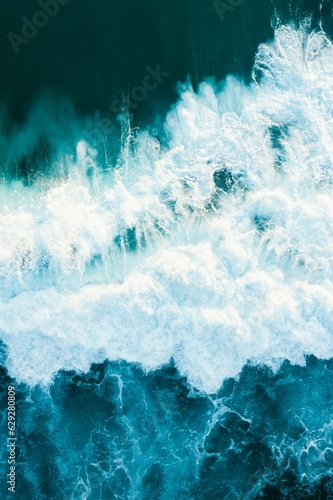 Aerial view of the wild and powerful waves of the sea in Burleigh Heads, Queensland