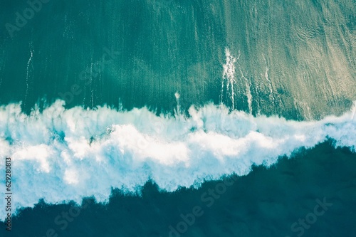 Aerial view of the wild and powerful waves of the sea in Burleigh Heads, Queensland