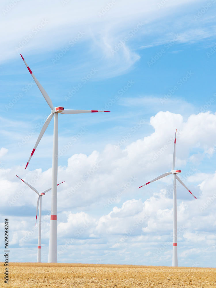 Wind turbine in front of bright blue sky Wind turbine in front of bright blue sky