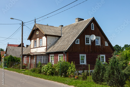 Traditional wooden buildings in village of Tujsk. Zulawy, Poland.