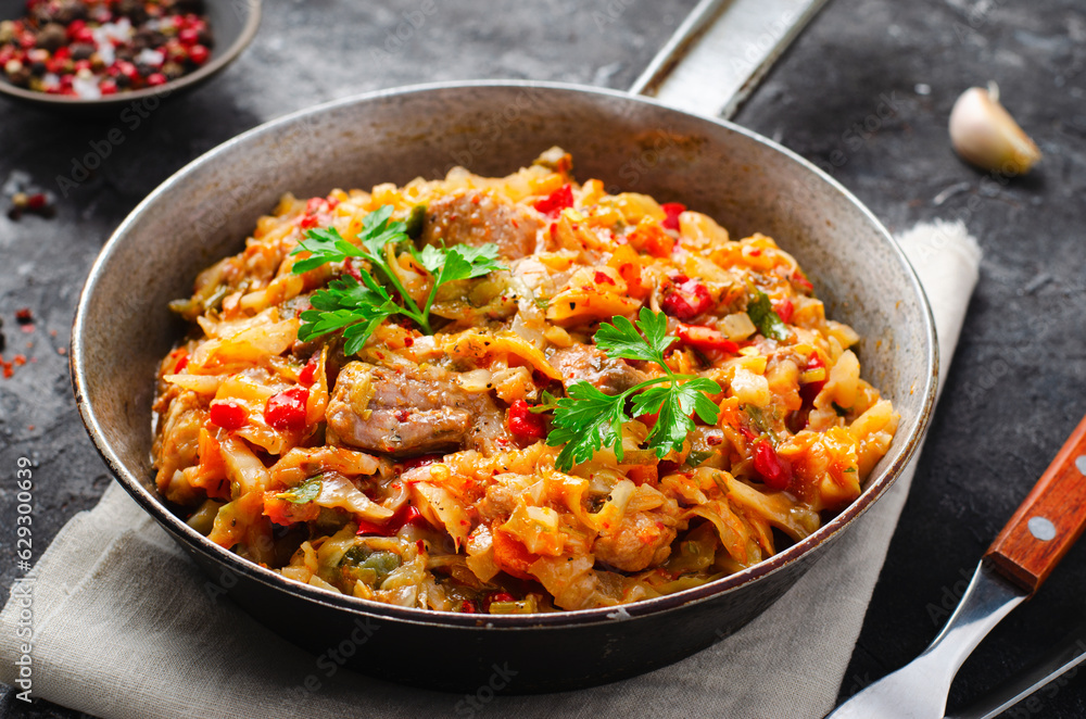 Stewed Cabbage with Meat and Vegetables, Comfort Food, Tasty Meal Stewed Cabbage with Meat and Vegetables, Comfort Food, Tasty Meal