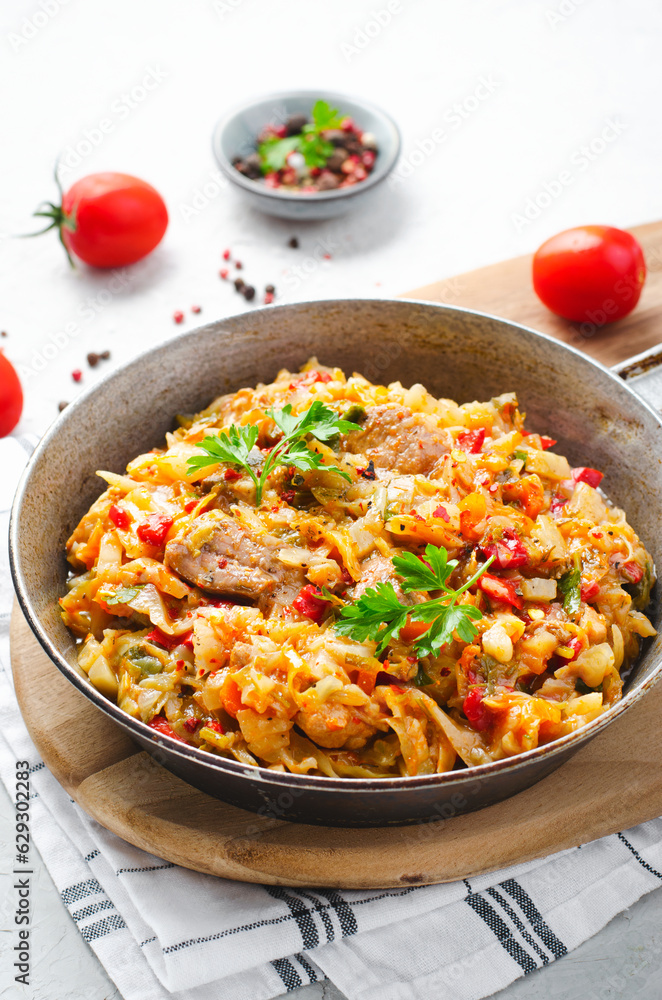 Stewed Cabbage with Meat and Vegetables, Comfort Food, Tasty Meal Stewed Cabbage with Meat and Vegetables, Comfort Food, Tasty Meal
