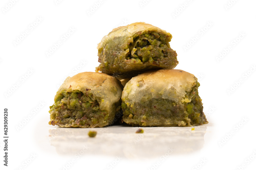 Turkish pistachio baklava isolated on white background. Turkish pistachio baklava isolated on white background.