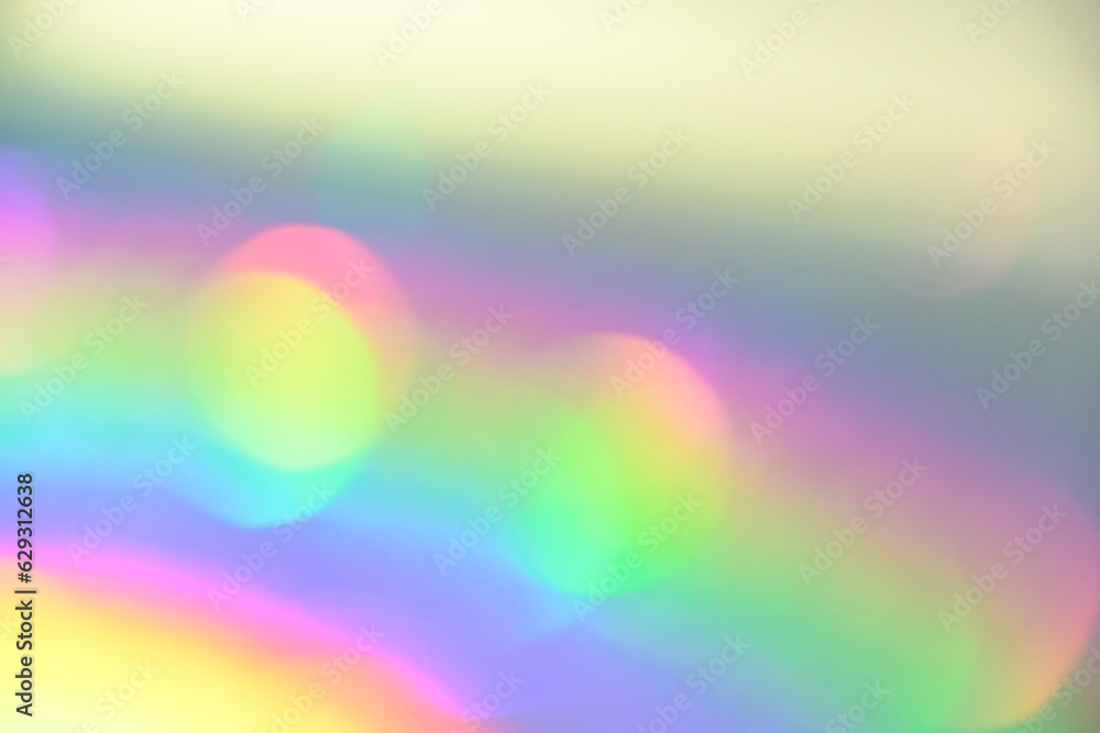 colorful abstract neon pastell rainbow bokeh gradient background. multicolored glowing texture