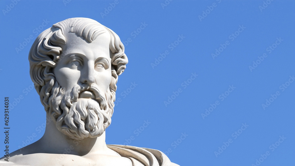 Famous Greek philosopher - Aristotle stone statue against the blue sky with space to write your text
