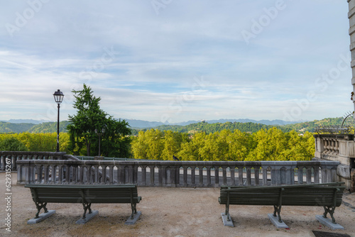 View from the Boulevard des Pyrenees in Pau with their iconic benches and street lamps