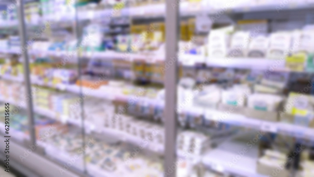 Fototapeta premium Abstract blur image of supermarket background. Defocused shelves. CPG products. Grocery shopping. Store. Retail industry. Food quality. Discount. Inflation and crisis concept. Aisle. Profitability