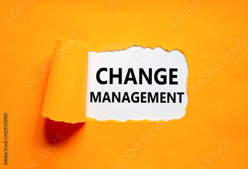 Change management symbol. Concept words Change management on beautiful white paper. Beautiful orange background. Business change management concept. Copy space.