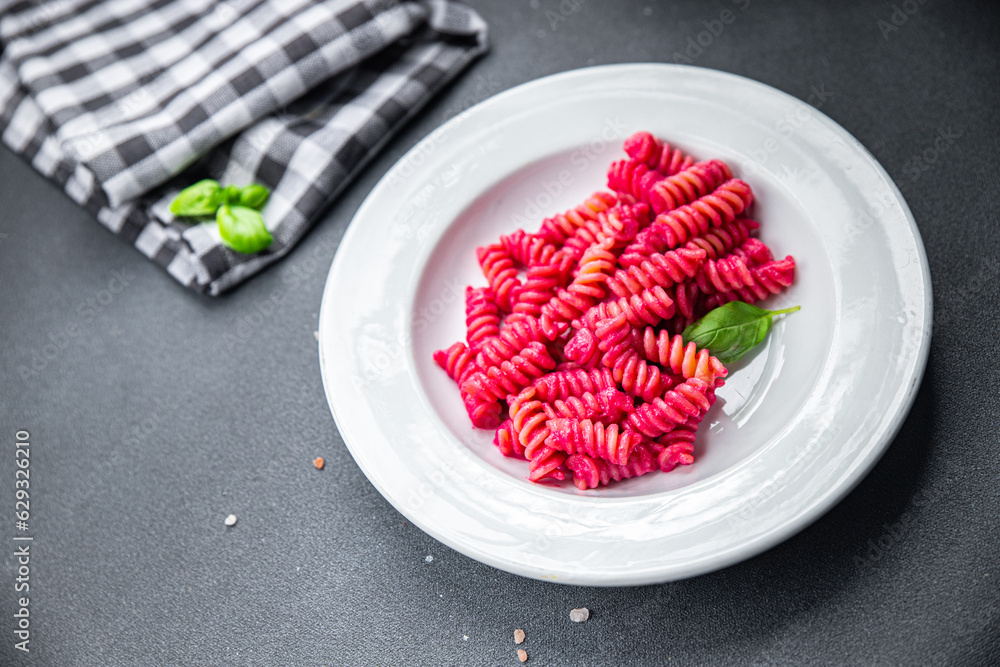 pink pasta beet sauce vegetable fusilli beetroo fresh food meal snack vegetarian food on the table copy space food background rustic top view pink pasta beet sauce vegetable fusilli beetroo fresh food meal snack vegetarian food on the table copy space food background rustic top view