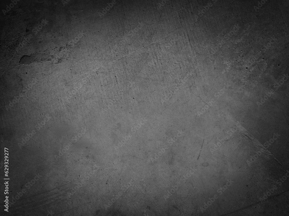 Grey textured concrete wall background. Dark edges Grey textured concrete wall background. Dark edges