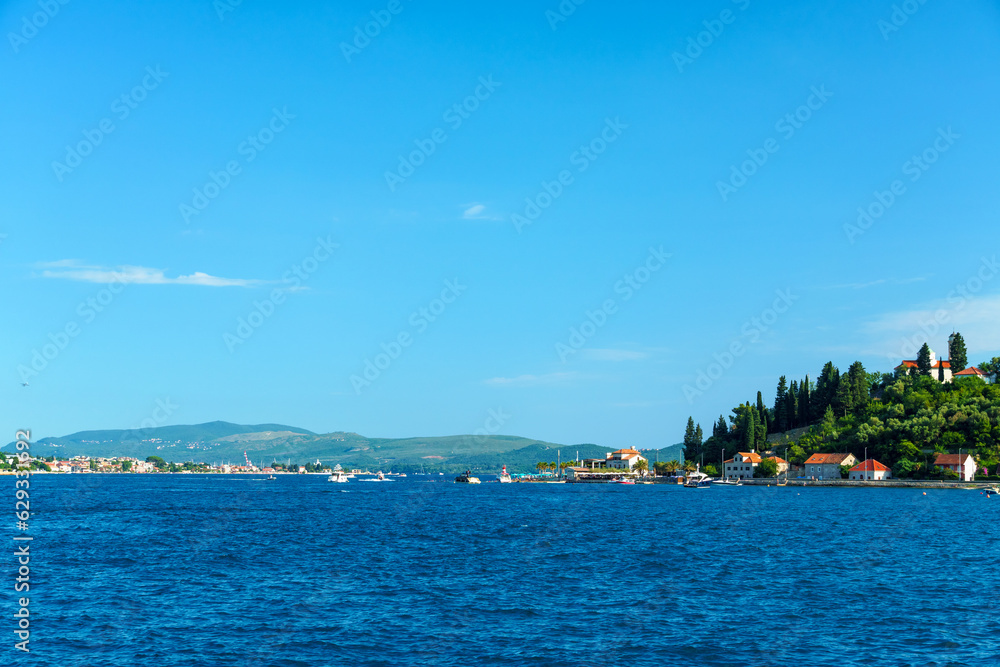 seascape during a voyage on a yacht in the Bay of Kotor, Montenegro, bright sunny day, mountains and sea, travel