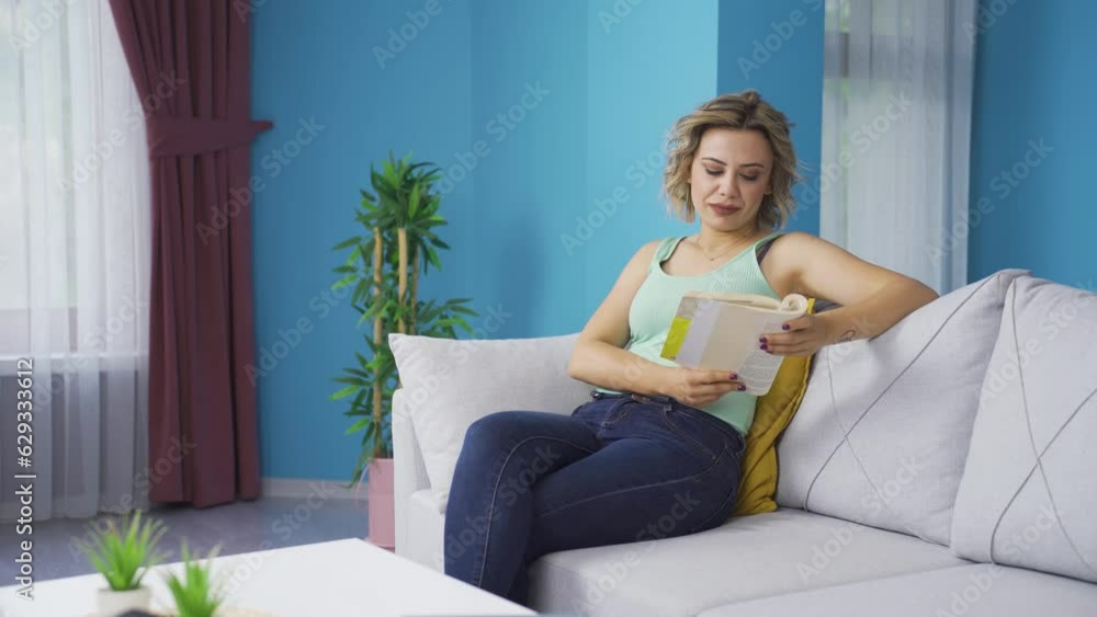The woman reading the book.