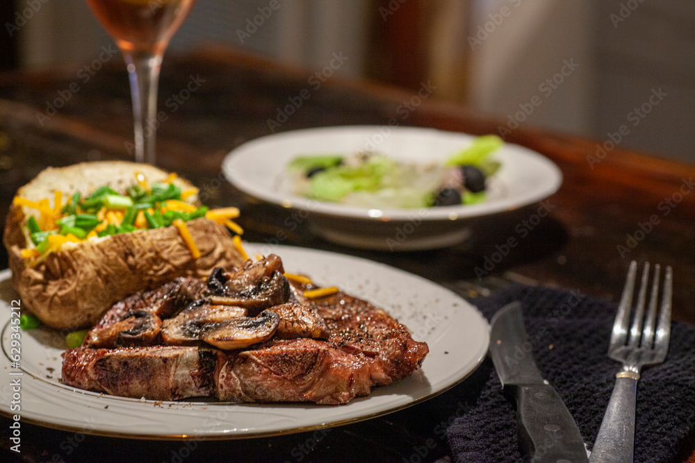 T bone steak dinner with sides. T bone steak dinner with sides.