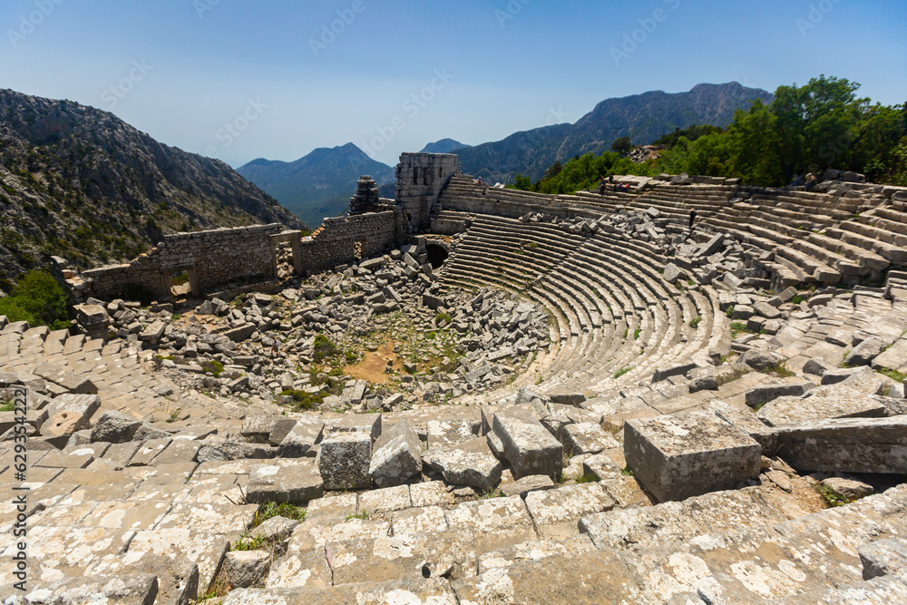 Picturesque landscape overlooking the ruins of the Roman amphitheater in the ancient city of Termessos, currently located ..near Antalya, Turkey