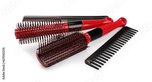 Set of plastic hair brushes and combs isolated on white