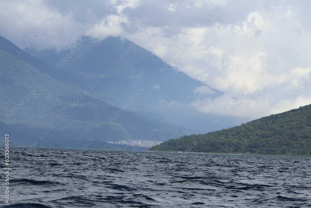 Boat view of the mountain and volcanos in Guatemala 