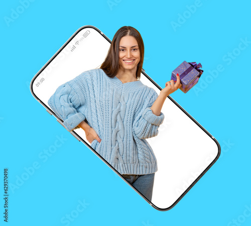 Woman with gift box. Girl i...