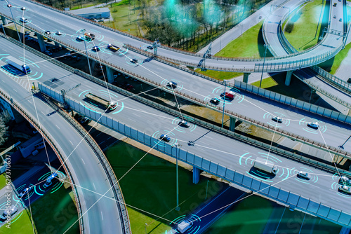 Autobahn with cars. Transport with lines symbolizing satellite communications. Road transport infrastructure city. Satellite navigation. Cars on road. Modern transport technologies. Autobahn top view
