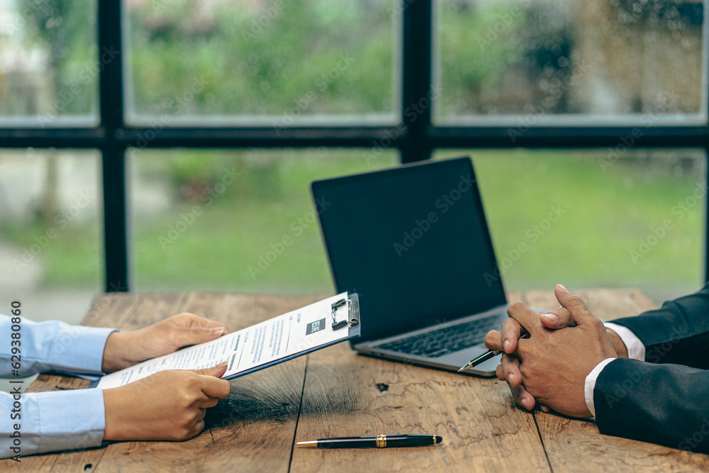 confident-female-candidate-talking-answering-questions-in-job-interview