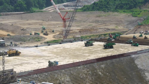 Akita, Japan - July 29, 2023: Time Lapse of Concrete placement or concrete casting at construction of Naruse dam in Akita, Japan
 photo