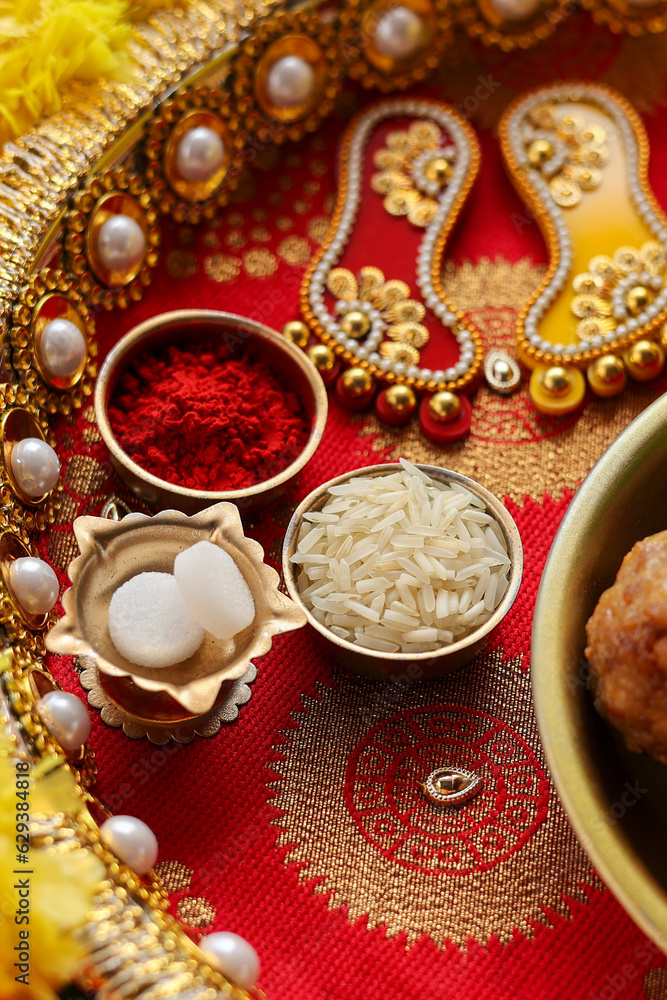 kumkum powder in golden bowl use for indian traditional god worship and applying a bindi on forehead of woman for good luck. Pooja Material Puja Sahitya in Hindu Religion from. Decorated Pooja Thali. kumkum powder in golden bowl use for indian traditional god worship and applying a bindi on forehead of woman for good luck. Pooja Material Puja Sahitya in Hindu Religion from. Decorated Pooja Thali.