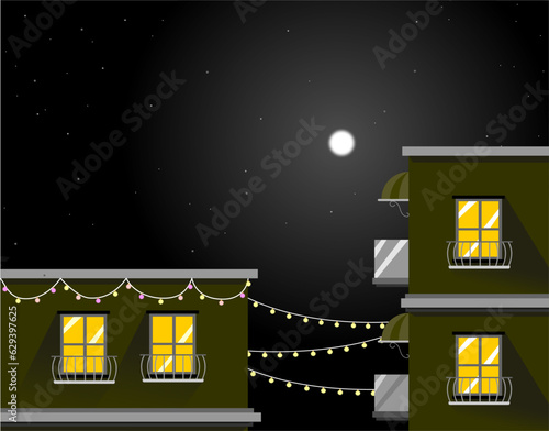 View of night sky with moon and stars from building with decoration lamps