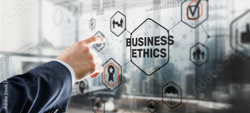 Slika na platnu Business man writing business ethic concept on virtual screen