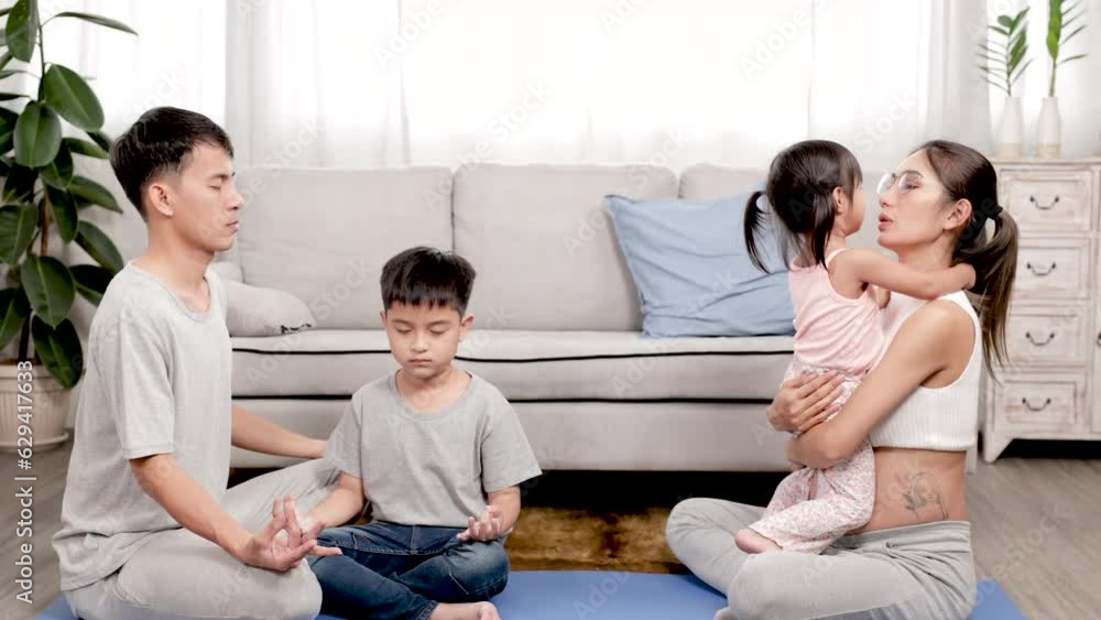 4k, healthy Asian family spending time together in living room with two kids daughter and son, parents playing yoga with children, pregnant mother hugging naughty daughter kiss mom in cozy living room 4k, healthy Asian family spending time together in living room with two kids daughter and son, parents playing yoga with children, pregnant mother hugging naughty daughter kiss mom in cozy living room