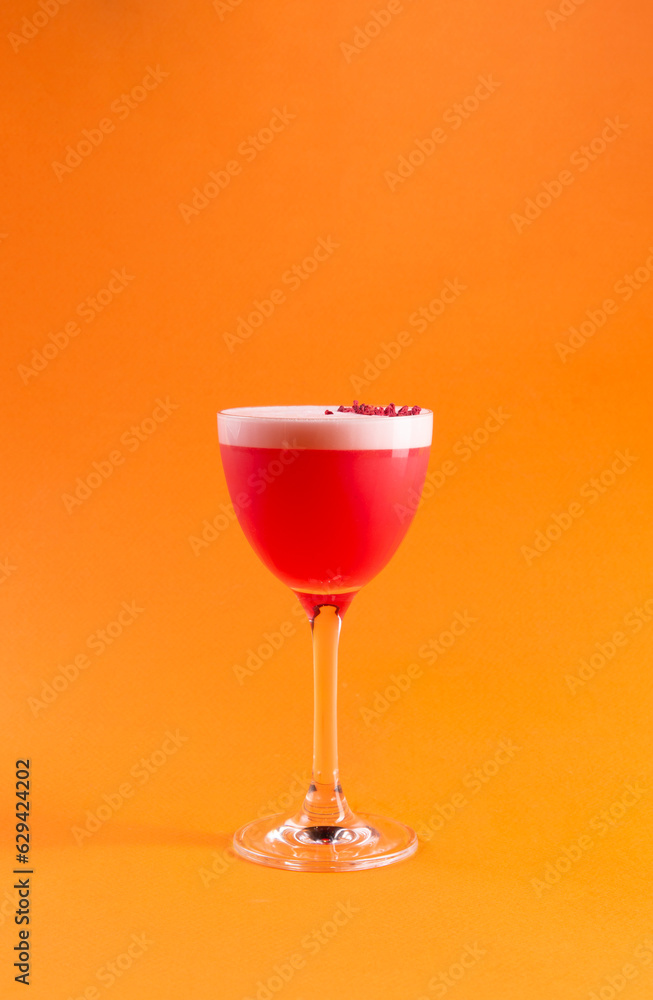 Red cocktail in a tall glass. Red cocktail in a tall glass.