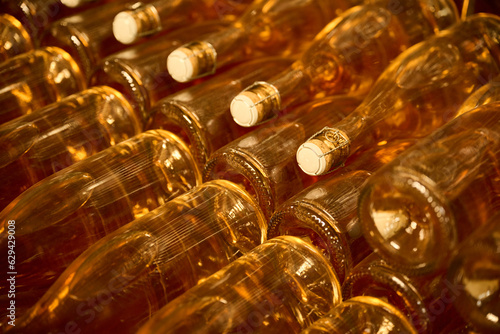 rose wine bottles without label at a warehouse