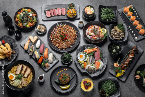 many traditional japanese food dishes variety on grey background