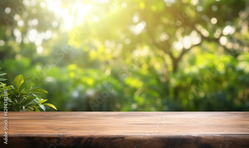 empty wooden table top  positioned in front of a blurred background of a lush green garden bathed in soft sunlight