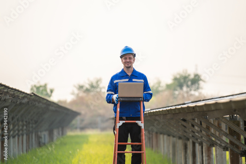 Portrait of engineer work to maintenance of photovoltaic panel system.