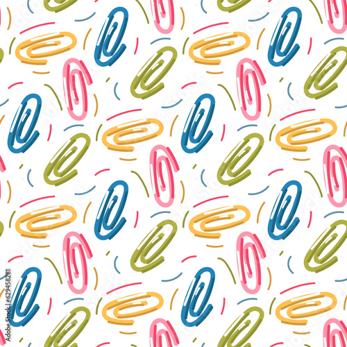 Seamless repeating cartoon pattern for school or office with colored paper clips on a white background. The theme of the school, the desktop. Printing for packaging. Textiles and paper