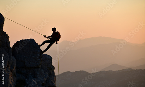 Young Athlete's Challenging Rock Climbing
 photo