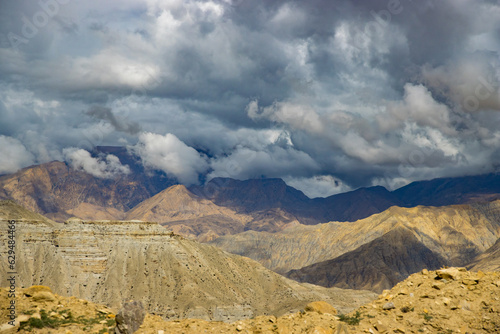 Breathtaking Landscape of Upper Mustang Desert Landscape alongside Kaligandaki River in Nepal photo