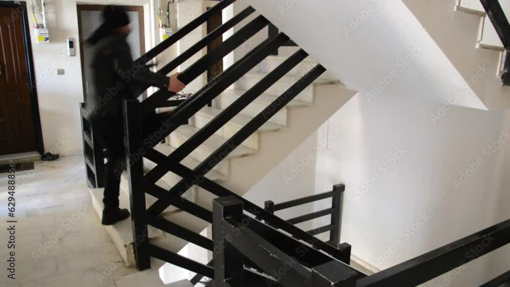 man running up stairs man running up stairs