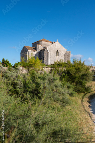 Talmont sur gironde, View of the church Sainte Radegonde 12th century. High quality photo © FreeProd