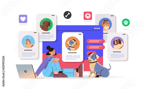 girl owner using pet app on laptop cute dogs best friends domestic animals social media application concept horizontal