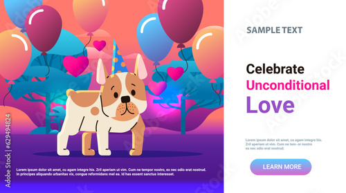 Happy national dog day greeting card cute doggy posing in party hat holiday of domestic animals concept horizontal