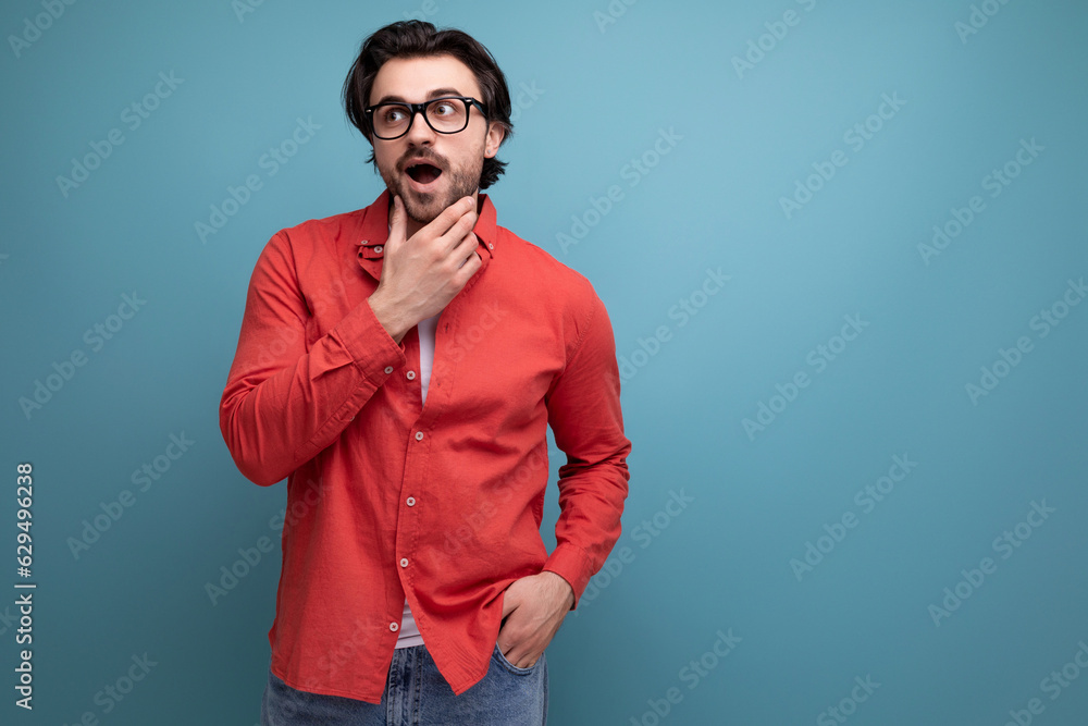 stylish smart european brunette 35 year old man in a shirt thought