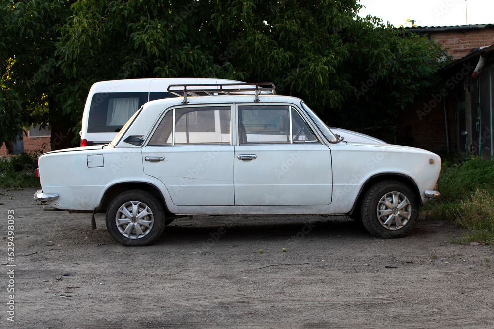 Old soviet white car. Old car