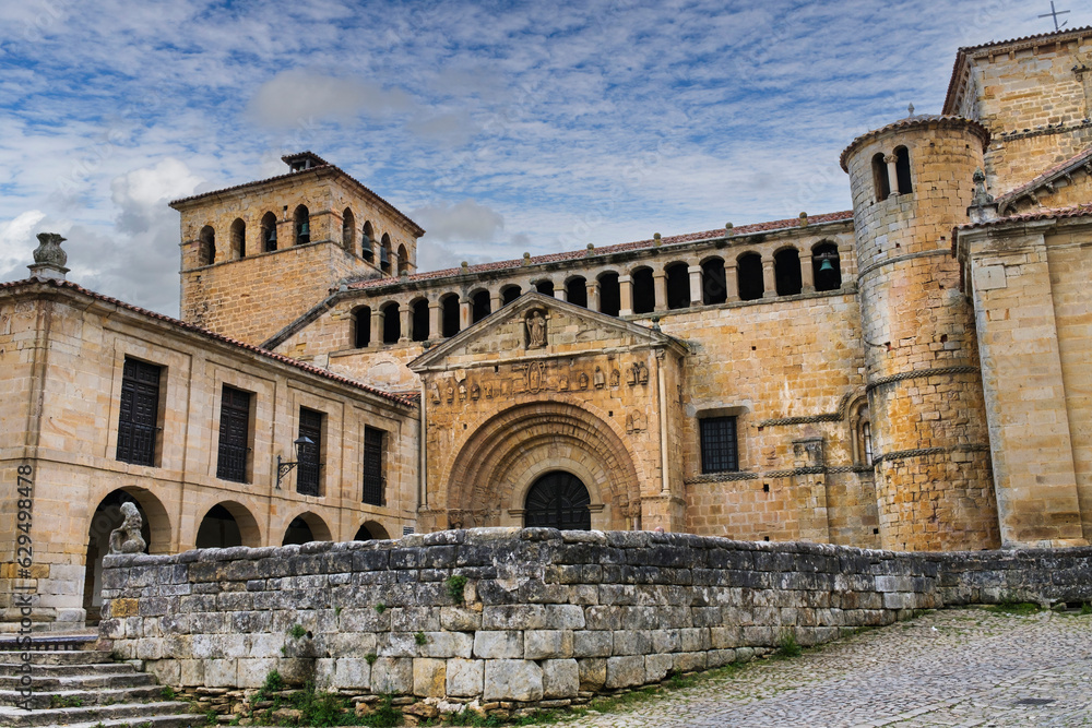 View of the main facade of the Romanesque collegiate church of Santillana del Mar.