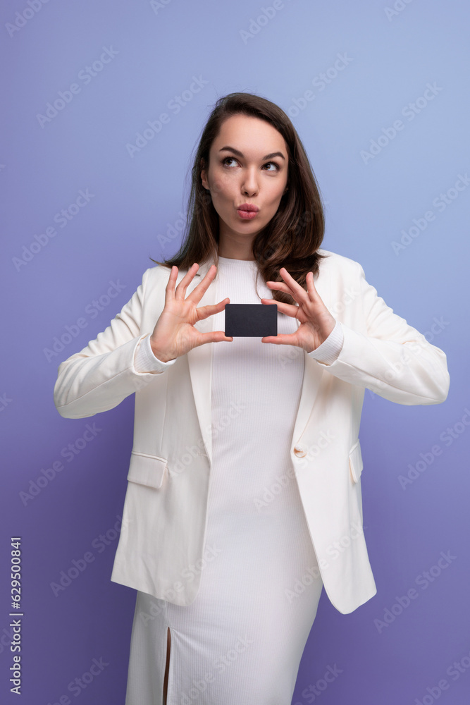 well-groomed brunette woman in office dress with card mockup well-groomed brunette woman in office dress with card mockup