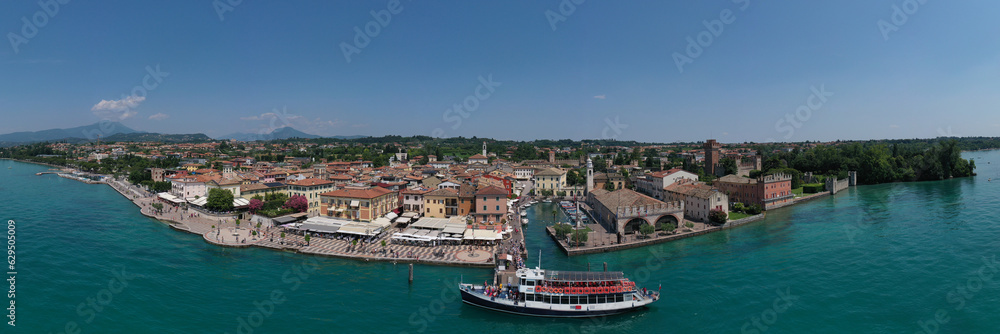 Aerial panorama of the popular resort, Lazise on Lake Garda. Lazise on Lake Garda in Italy, aerial view. Sights of Italy. Historic city on Lake Garda.