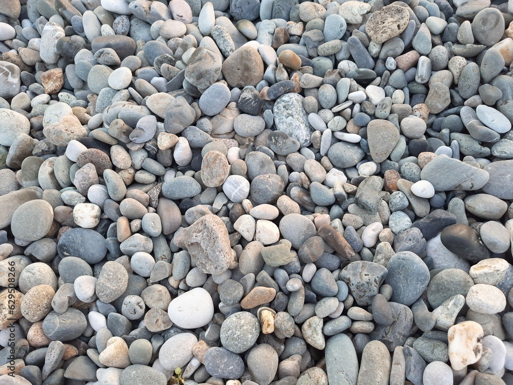 Abstract background of gray numerous rocky sea pebbles Abstract background of gray numerous rocky sea pebbles