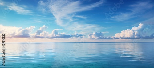 tropical beach panorama, seascape with a wide horizon, showcasing the beautiful expanse of the sky meeting the sea photo