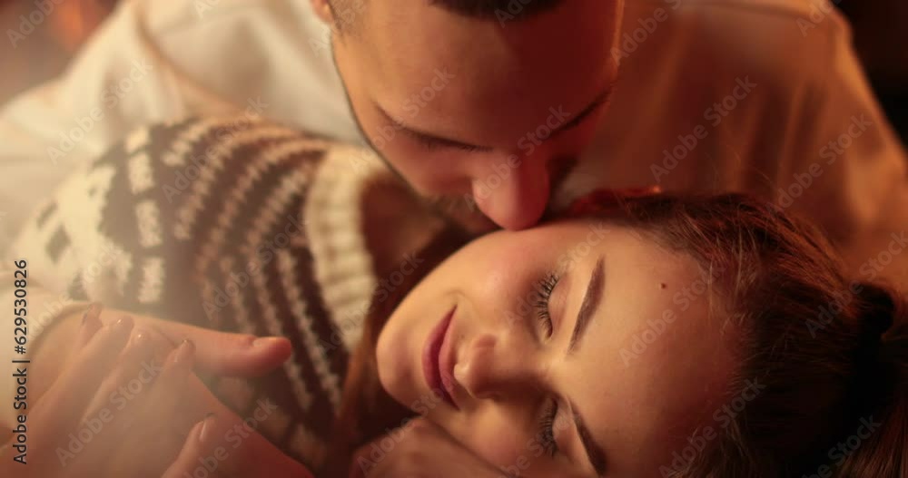 Kisses and hugs of a young couple in love. The boy leans towards the girl to kiss. Romantic moment. Kisses and hugs of a young couple in love. The boy leans towards the girl to kiss. Romantic moment.