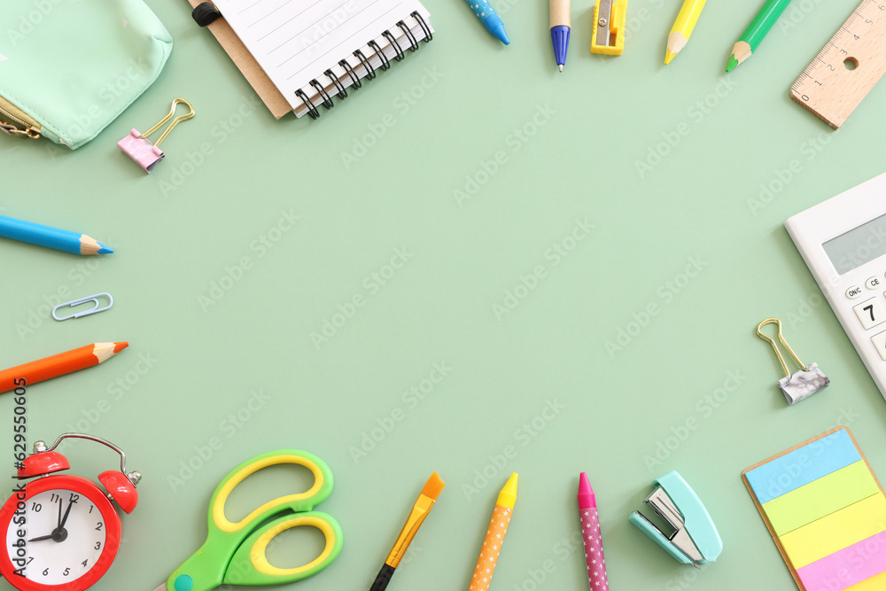 Back to school concept on pastel green background. Top view Back to school concept on pastel green background. Top view
