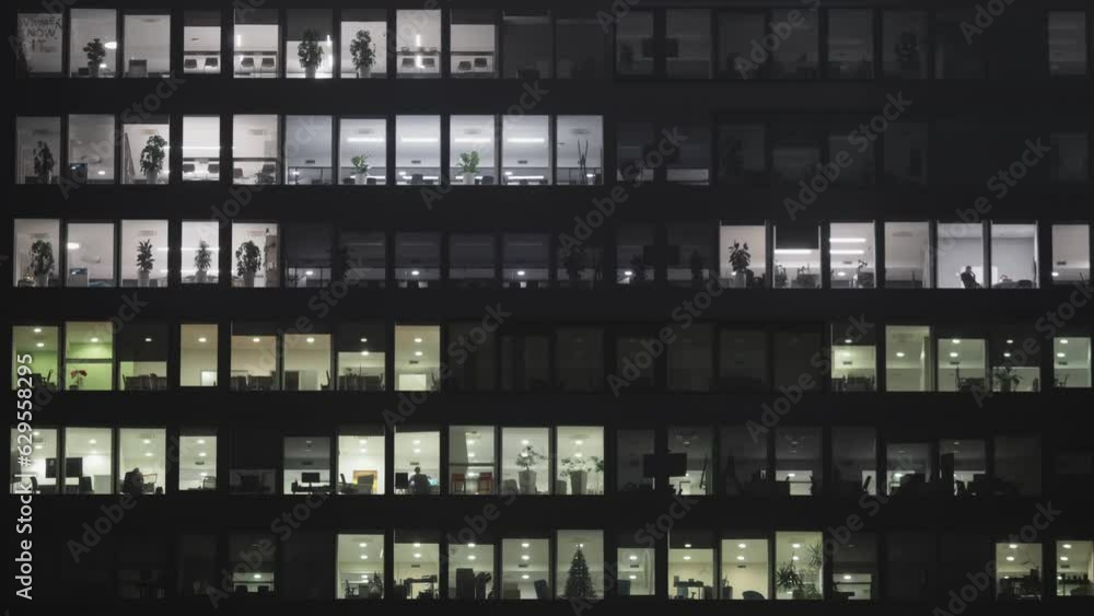 Lights switched off in the building's offices at the end of the working hours, timelapse Lights switched off in the building's offices at the end of the working hours, timelapse